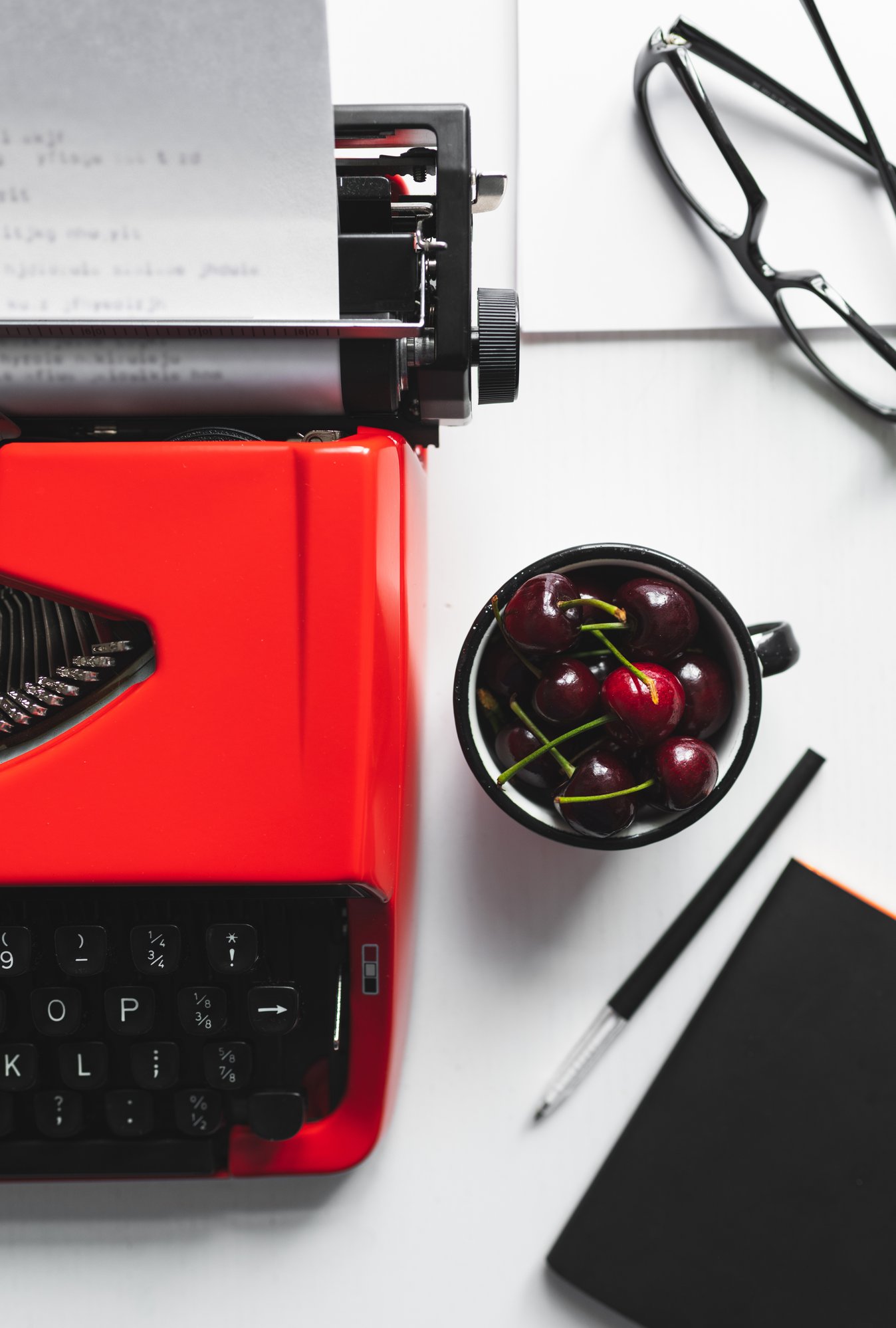 workplace-with-bright-red-vintage-typewriter-2024-09-19-11-34-28-utc
